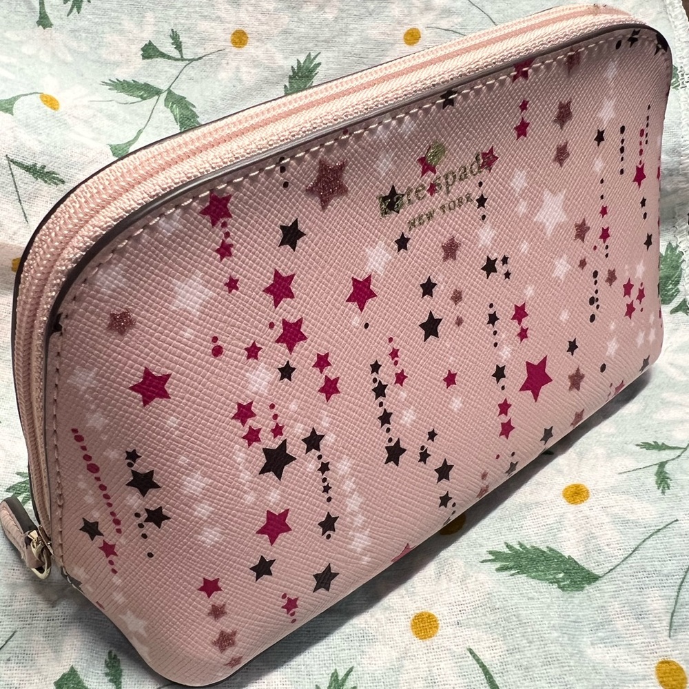 Kate spade cosmetic case in sparkle pink.